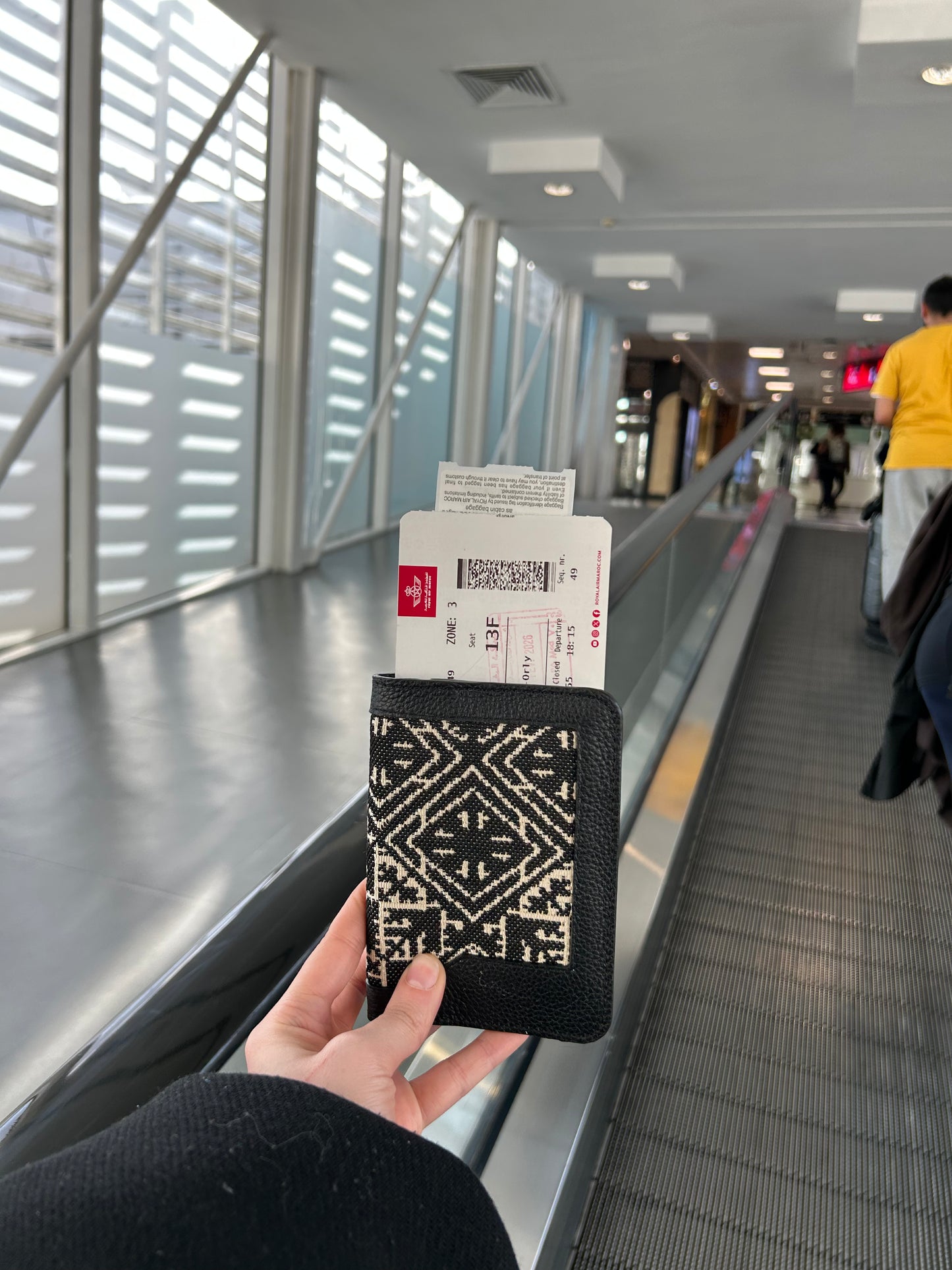 Phone pouch in embroidered effect fabric