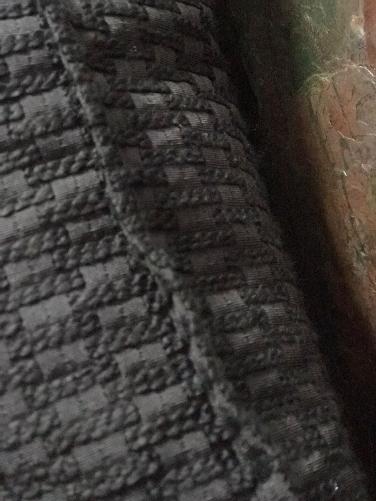 Détail du coussin noir