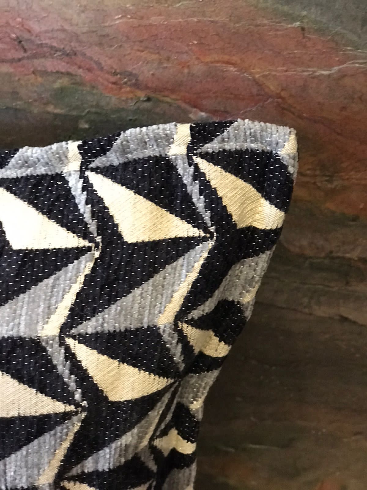 Détail du coussin carré en chenille