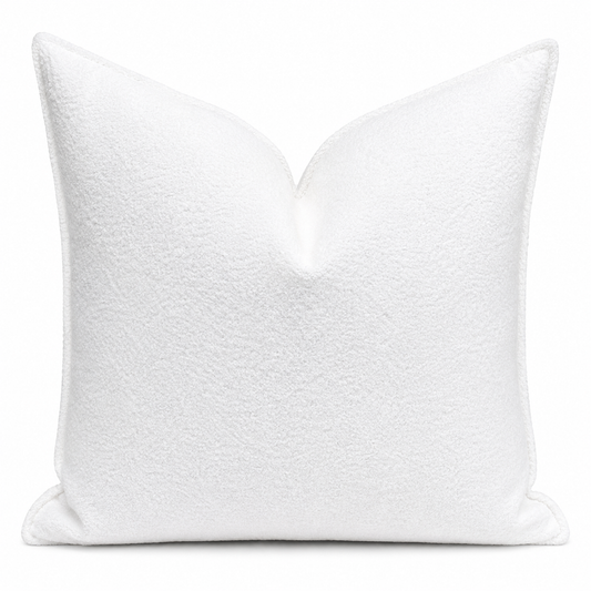 Coussin décoratif en bouclette tendance blanche
