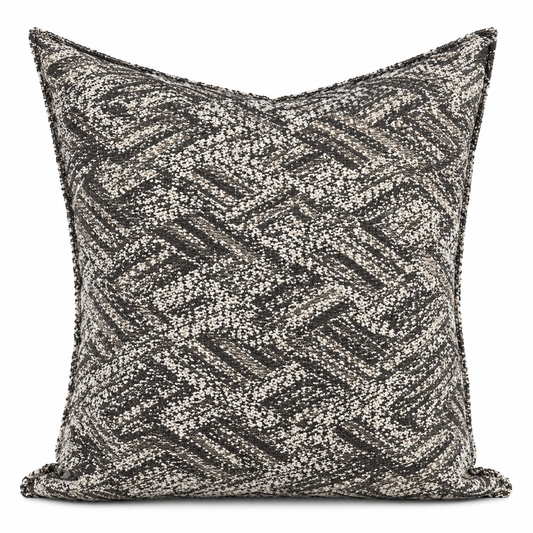 Coussin décoratif en bouclette dorée et noire