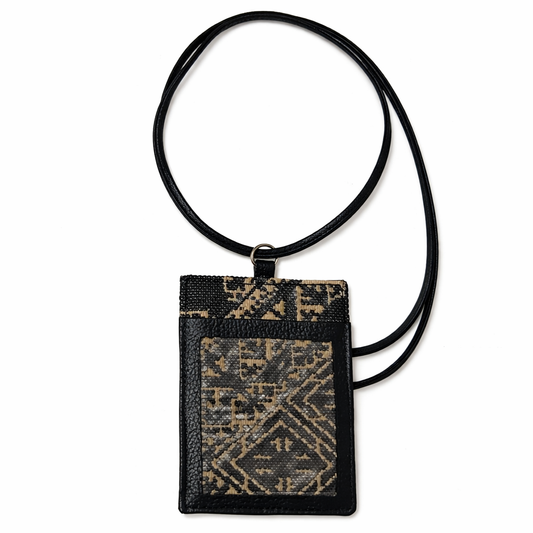 Phone pouch in embroidered effect fabric