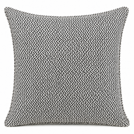 Coussin décoratif en bouclette chevron noir