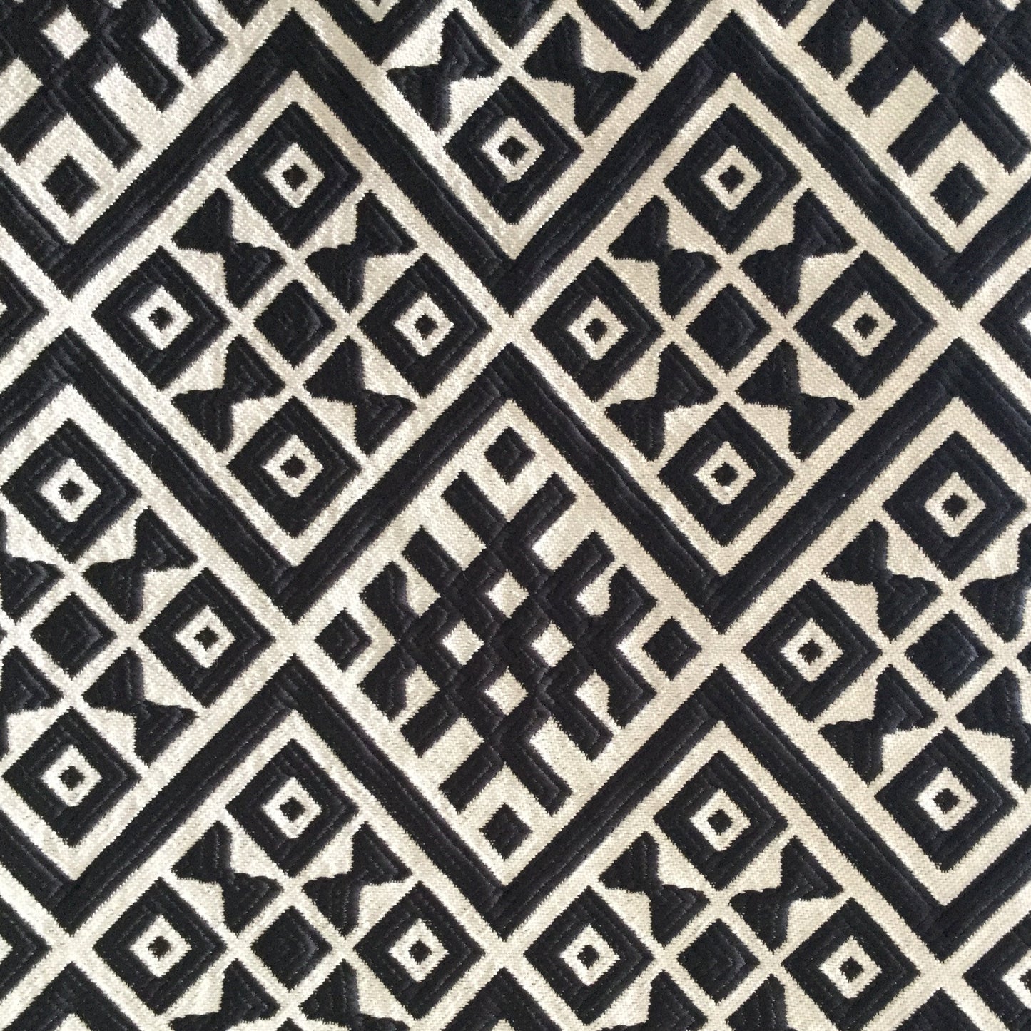 Geometric embossed fabric