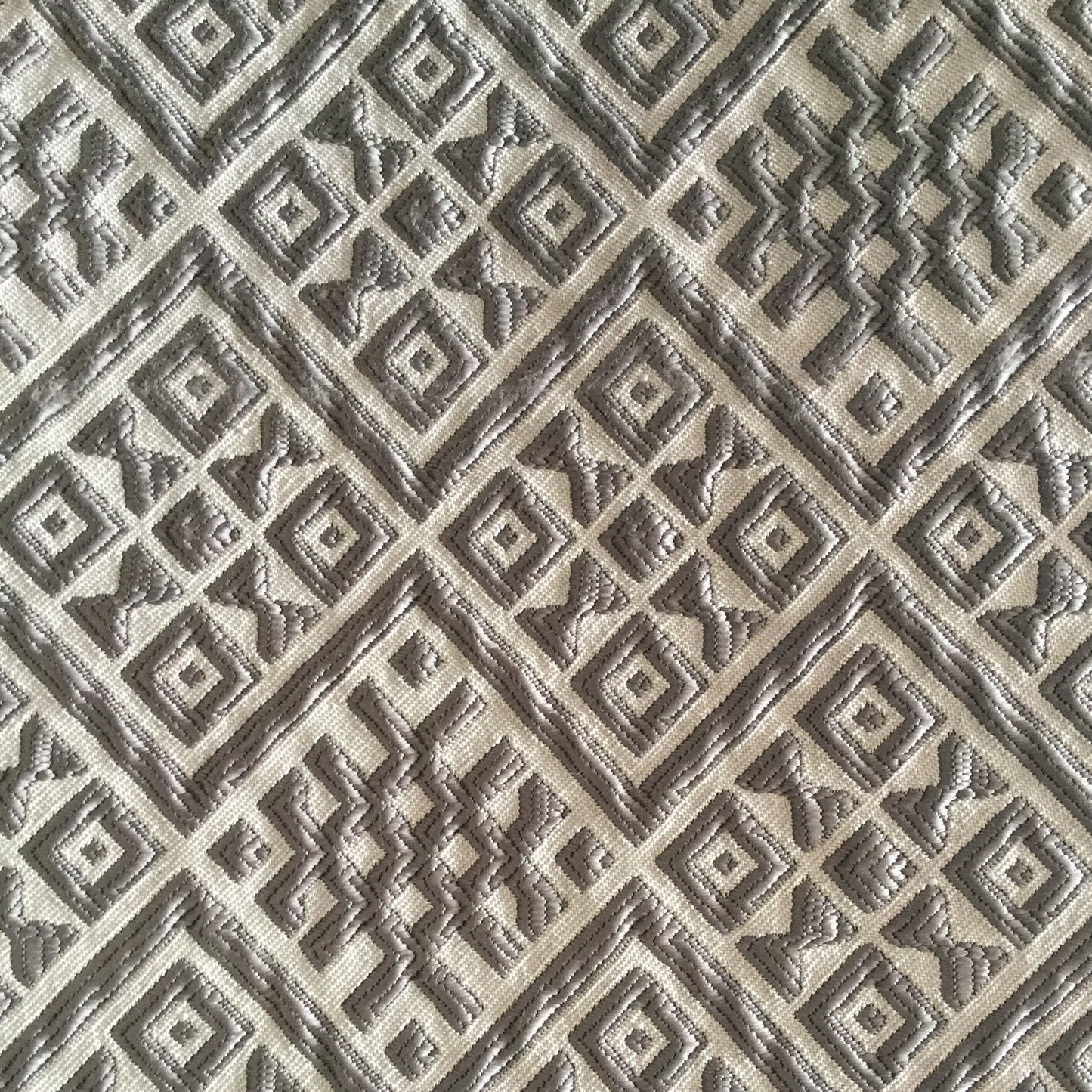 Geometric embossed fabric