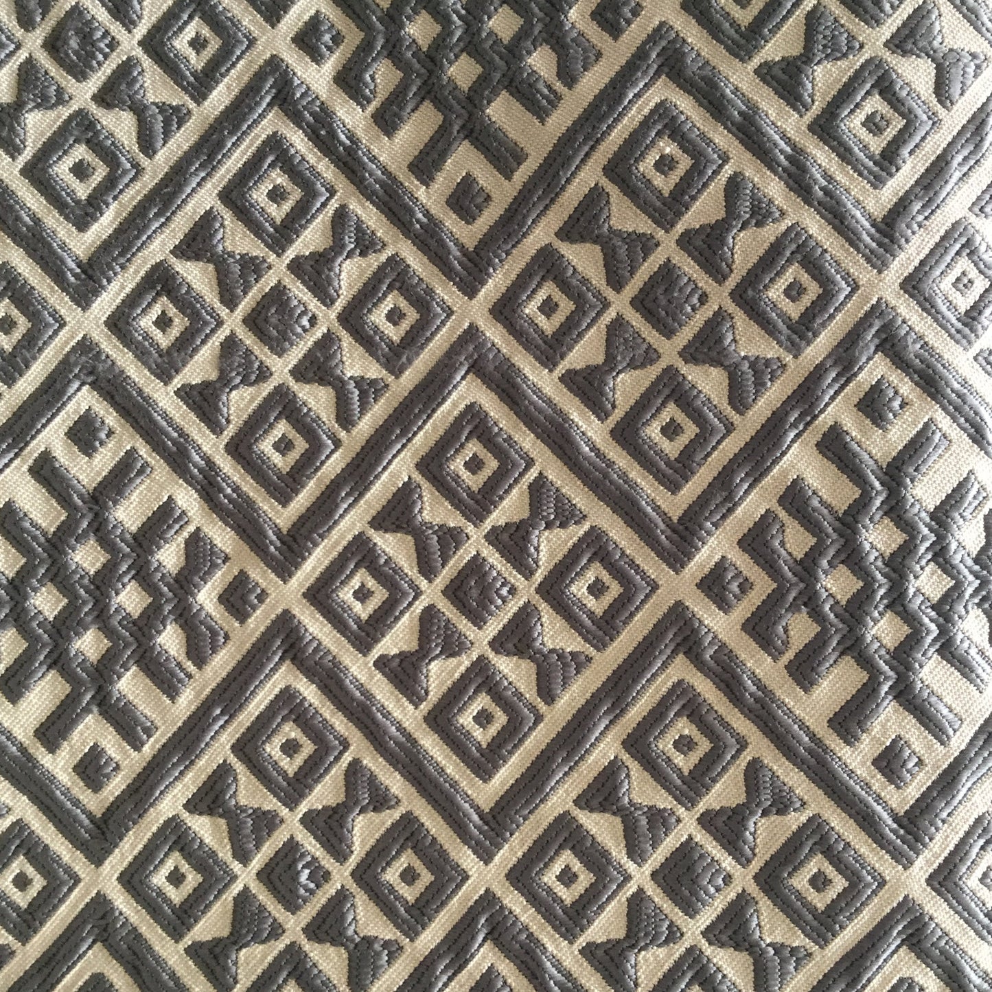 Geometric embossed fabric