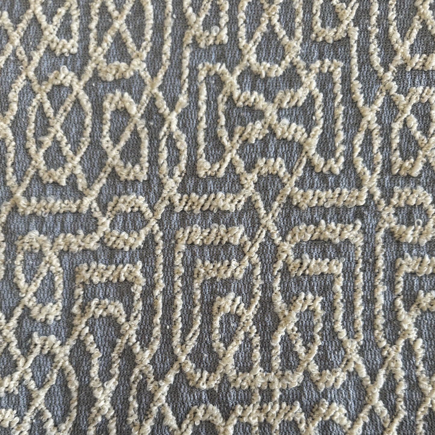 Bouclette fabric with double-sided geometric pattern 