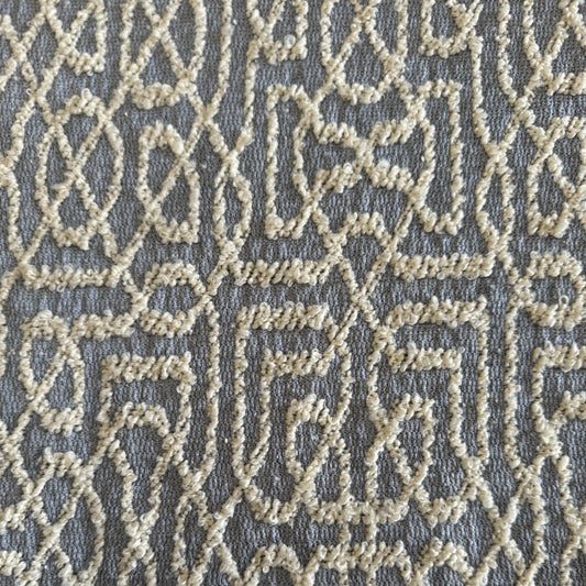 Bouclette fabric with double-sided geometric pattern 