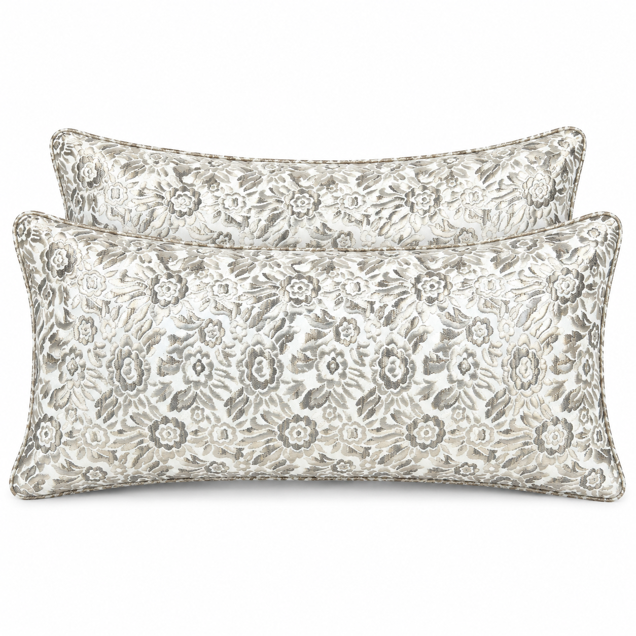Deux coussins rectangulaires à motif floral bronze et taupe tissé en relief, ambiance élégante et chaleureuse pour salon moderne.