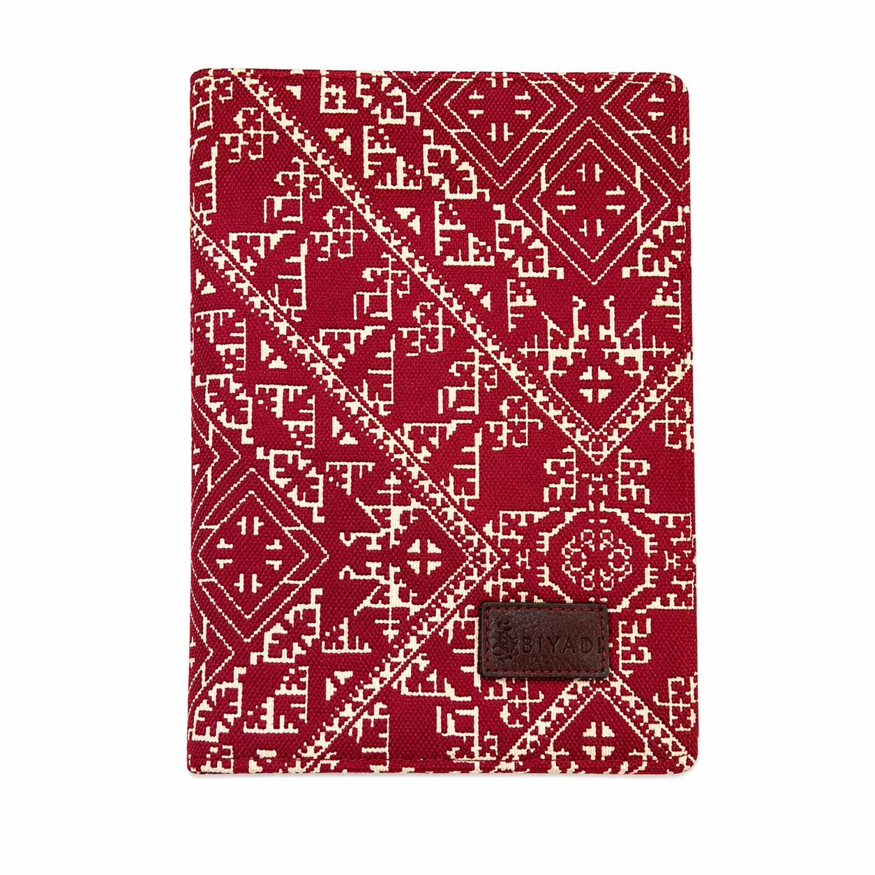 Carnet de notes Tarz bordeau Biyadi Collection avec couverture en tissu tissé au Maroc, motif géométrique noir et écru.