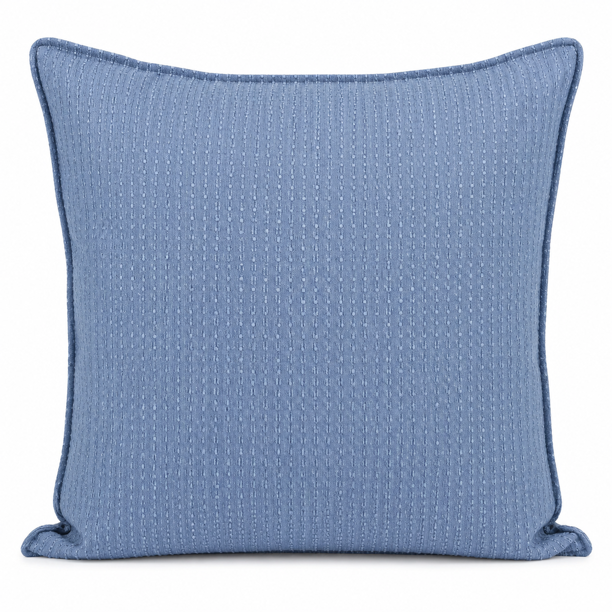 Coussin décoratif bleu texturé avec motif discret en relief, idéal pour une décoration intérieure moderne, élégante et apaisante.