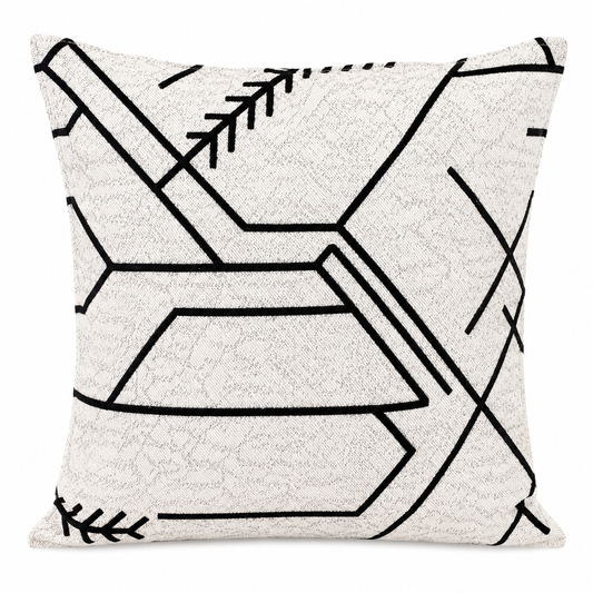Coussin décoratif blanc cassé à motif géométrique noir moderne, tissu texturé au style néobeldi contemporain fabriqué au Maroc.