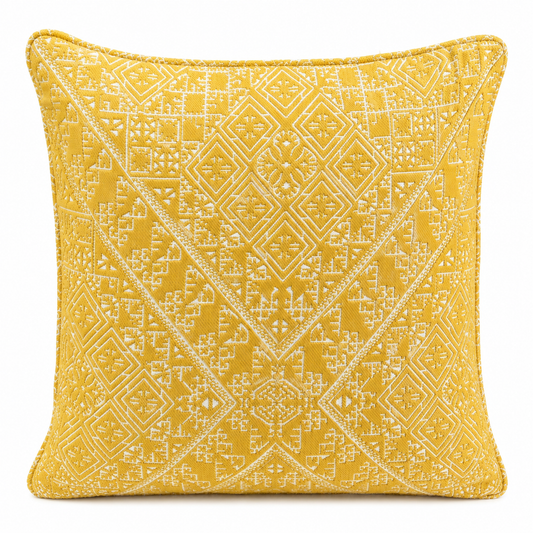 Coussin décoratif jaune  à motif ethnique tissé en relief, idéal pour une décoration chaleureuse et moderne.