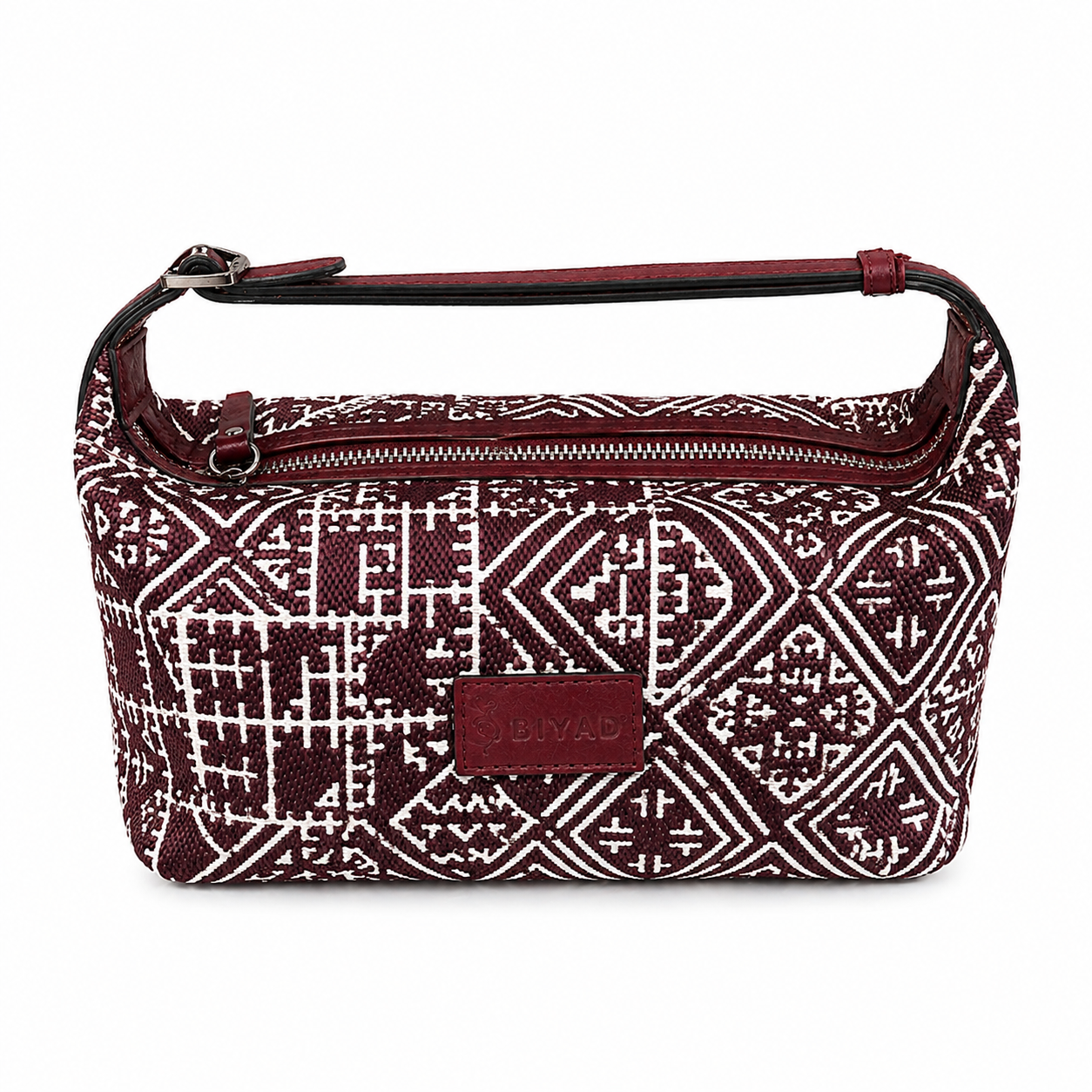 Sac baguette burgundy en tissu marocain tissé avec motif géométrique traditionnel et anse courte assortie.