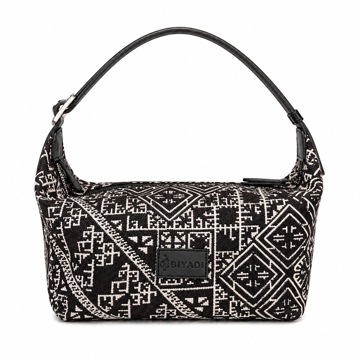 Sac baguette noir en tissu marocain tissé avec motif géométrique traditionnel et anse courte assortie.
