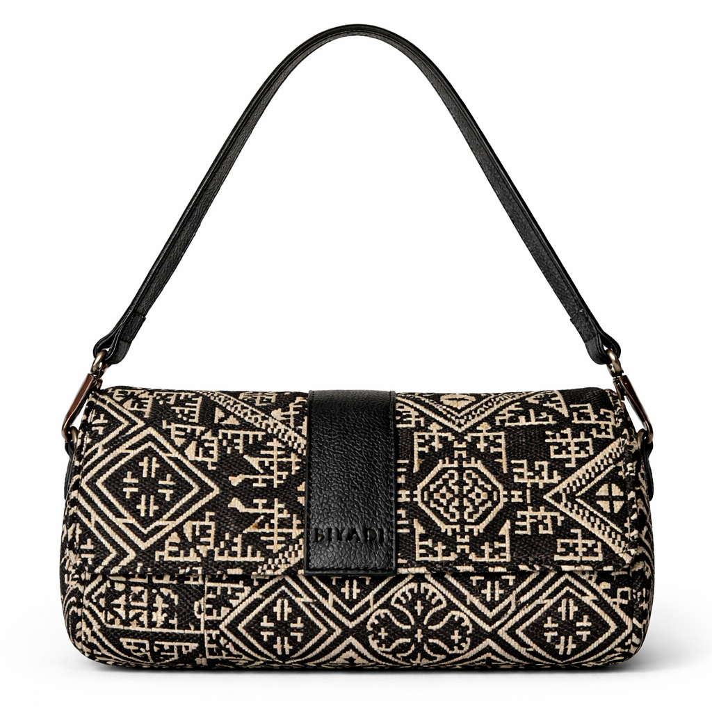 Sac baguette noir en tissu marocain à motif géométrique avec rabat et finitions en cuir noir