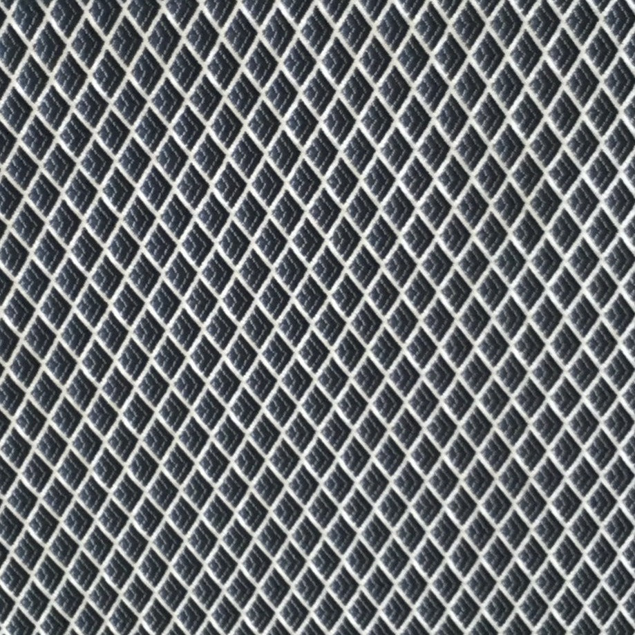 Tissu jaune à motif losanges géométriques bleus en relief, tissé au Maroc pour l'ameublement et la décoration intérieure.