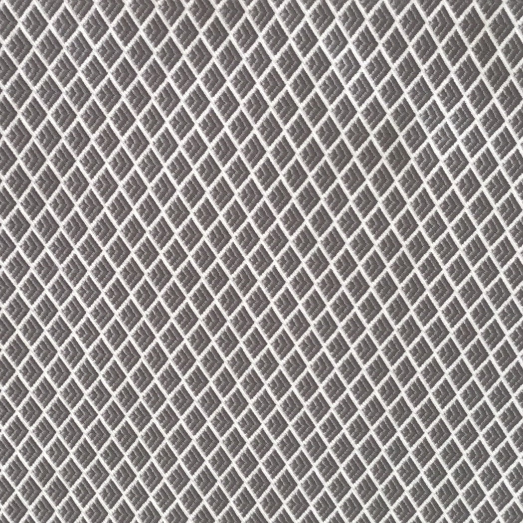 Tissu jaune à motif losanges géométriques gris en relief, tissé au Maroc pour l'ameublement et la décoration intérieure.