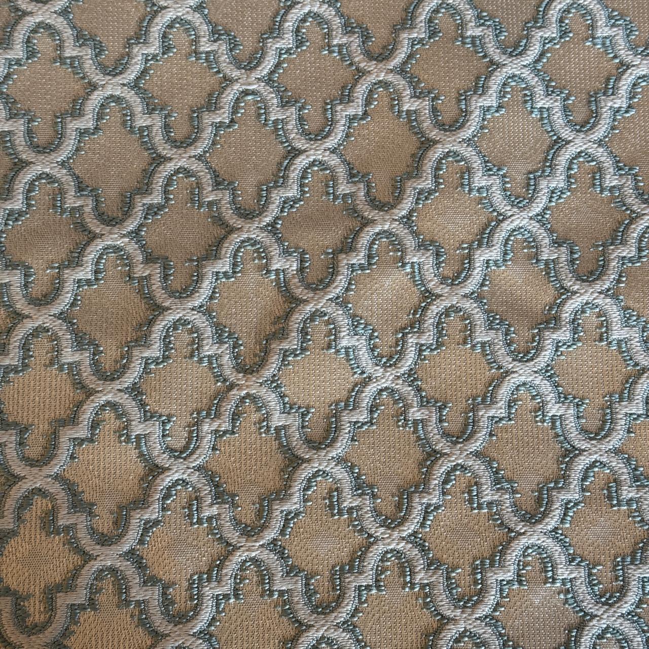 Tissu Moucharabieh vert eau à motif géométrique en relief, tissu d’ameublement exclusif tissé au Maroc par Biyadi Collection.