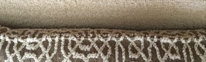 Cousssin décoratif rectangulaire en bouclette à motif 62x33cm