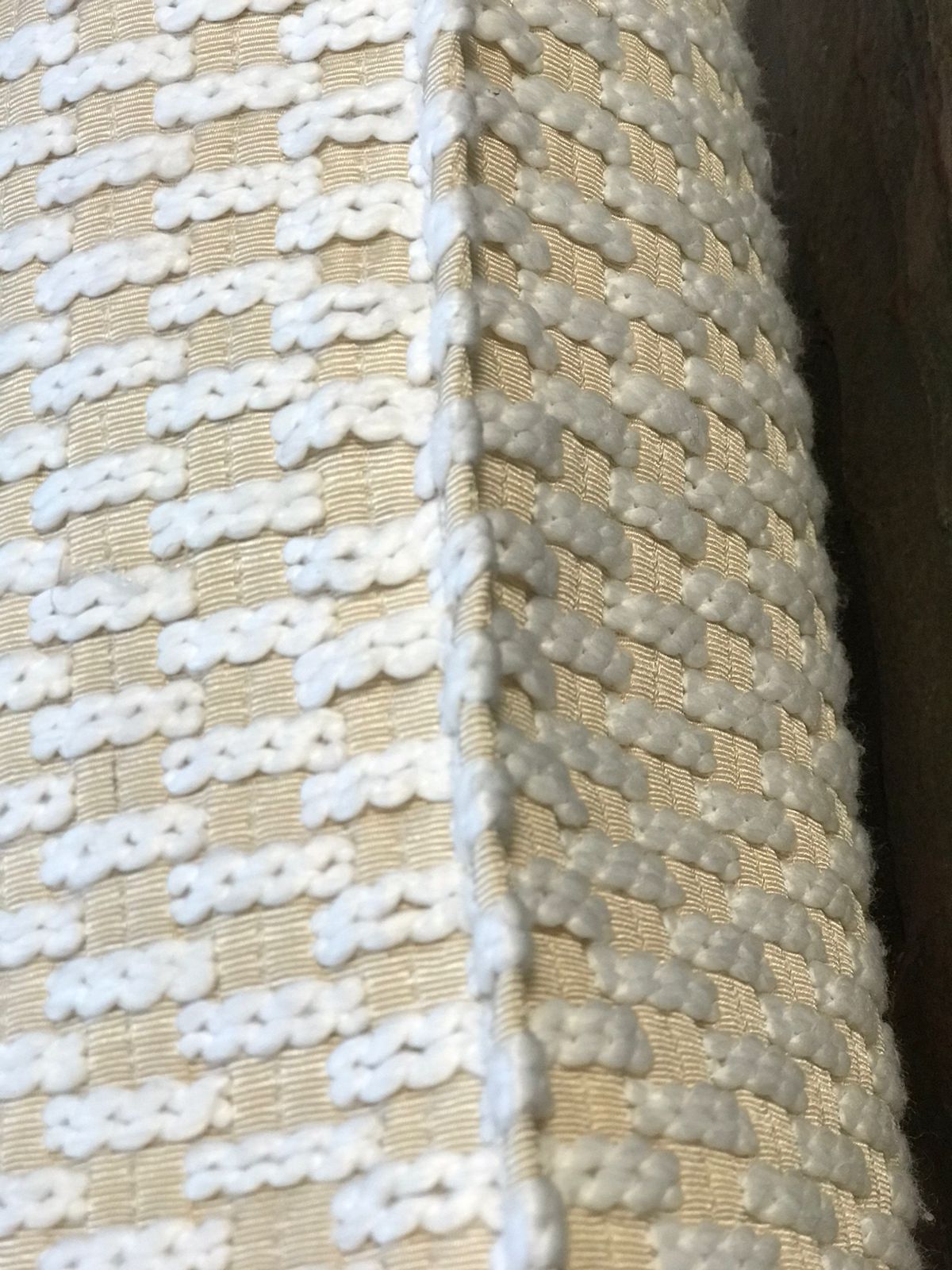 Détail du coussin en bouclette